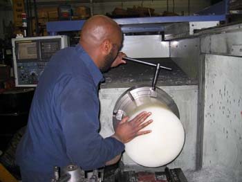 Loading Material into the CNC Lathe